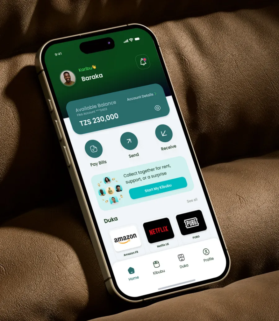A customer holding a phone with the FIKA app